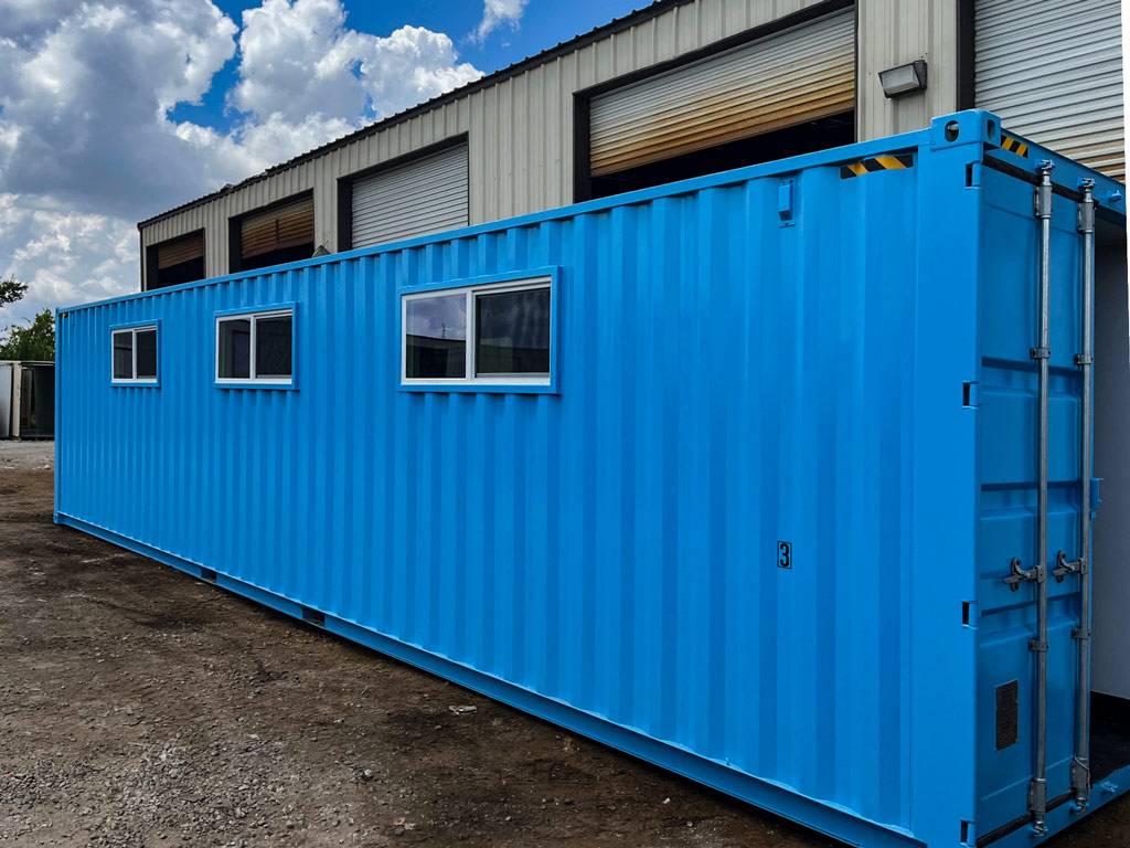 40-ft modified container windows installed and blue paint